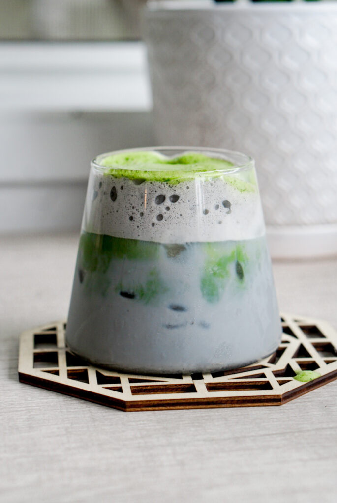 black sesame matcha latte in glass cup