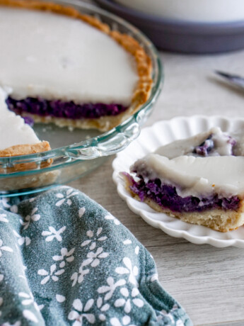 Okinawan sweet potato haupia pie with a slice cut out