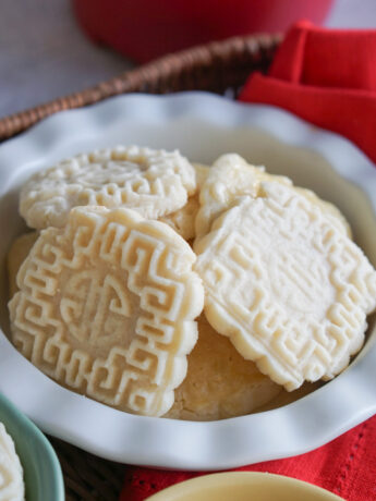 stack of mooncake cookies in a white bowl