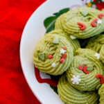 overhead shot of christmas wreath matcha cookies