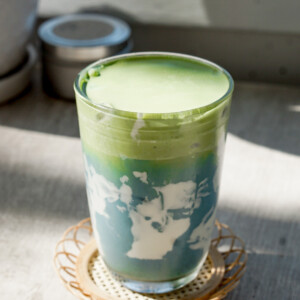 matcha cold foam over blue milk (earth day latte)