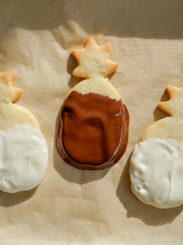 pineapple shaped macadamia nut cookies dipped in chocolate