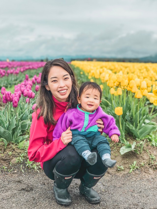 Mom and baby in the tulip fields