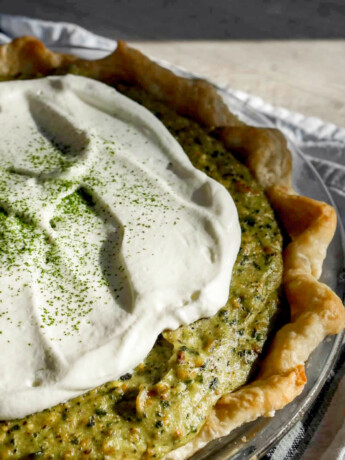 matcha pistachi pie overhead view with whipped cream