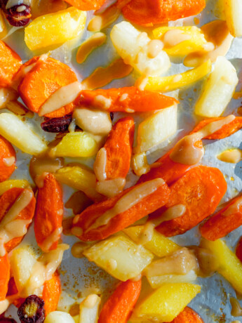 roasted carrots with maple tahini miso sauce overhead view