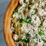 ramen cabbage salad overhead view in wooden bowl