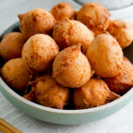 sata andagi piled in a bowl