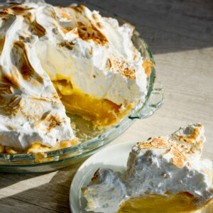 yuzu meringue pie with slice cut out